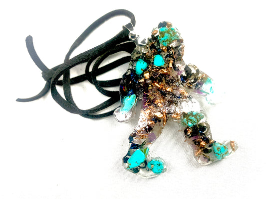 hand made orgone bigfoot pendant with quartz crystals and turquoise